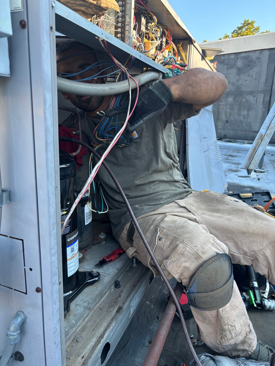 Emergency HVAC repair by Airmax technician