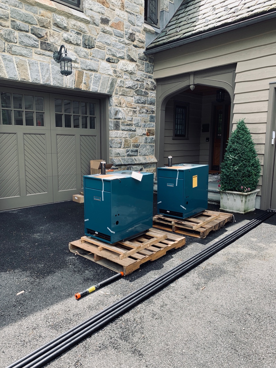 Dual Peerless boilers staged for estate installation by Airmax Heating \& A/C